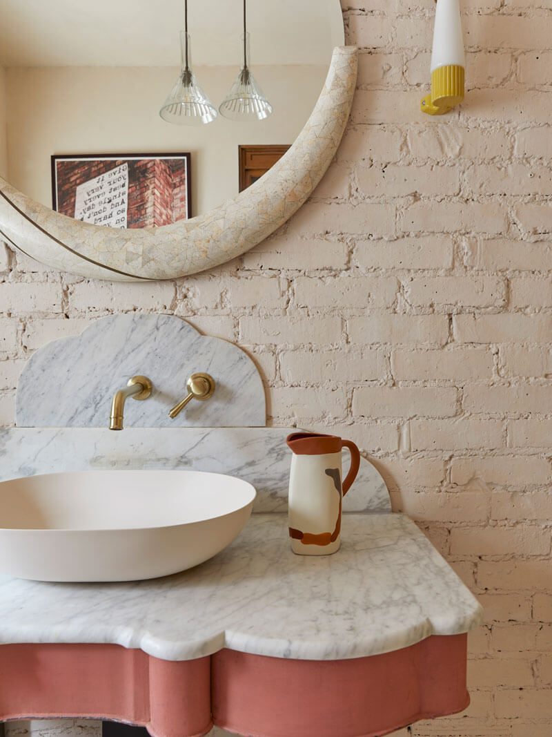 Vintage bathroom, Tunbridge Wells. Close up of marble vanity unit and vintage mirror
